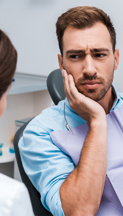 Patient with dental pain requiring emergency treatment